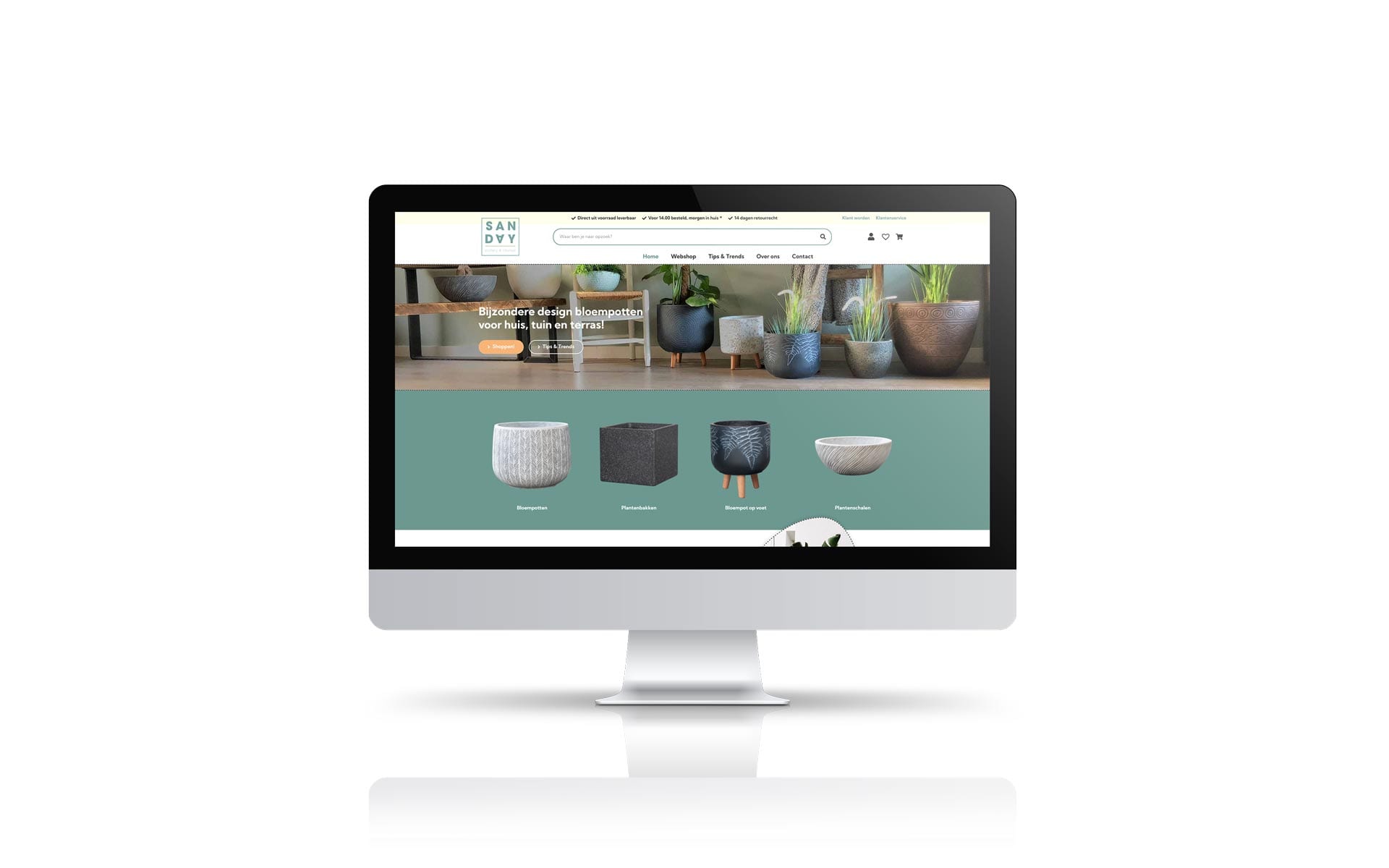 Homepage van de webshop van SANDAY met design bloempotten op een iMac
