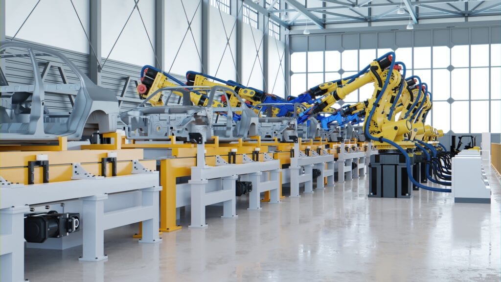 Productielijn met gele industriële robotarmen in een fabriekshal