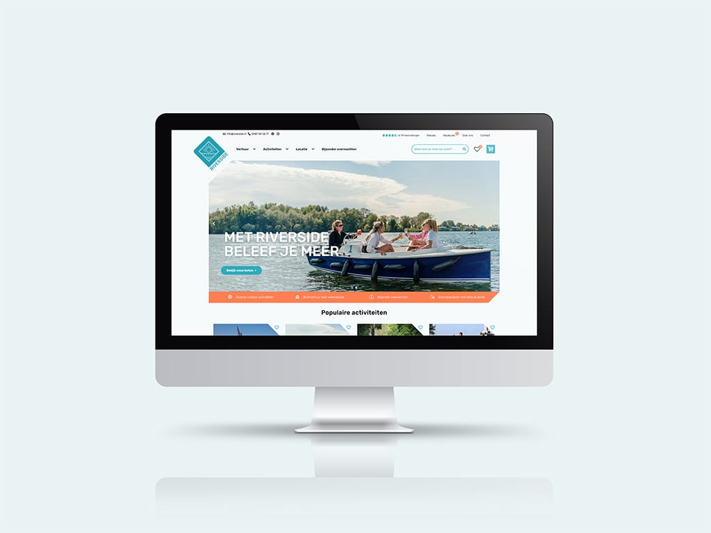 Homepage van de webshop van Riverside Outdoor op een iMac